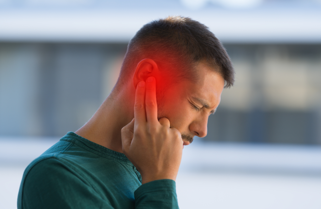 Hearing Loss and Tinnitus Man bothered by his tinnitus